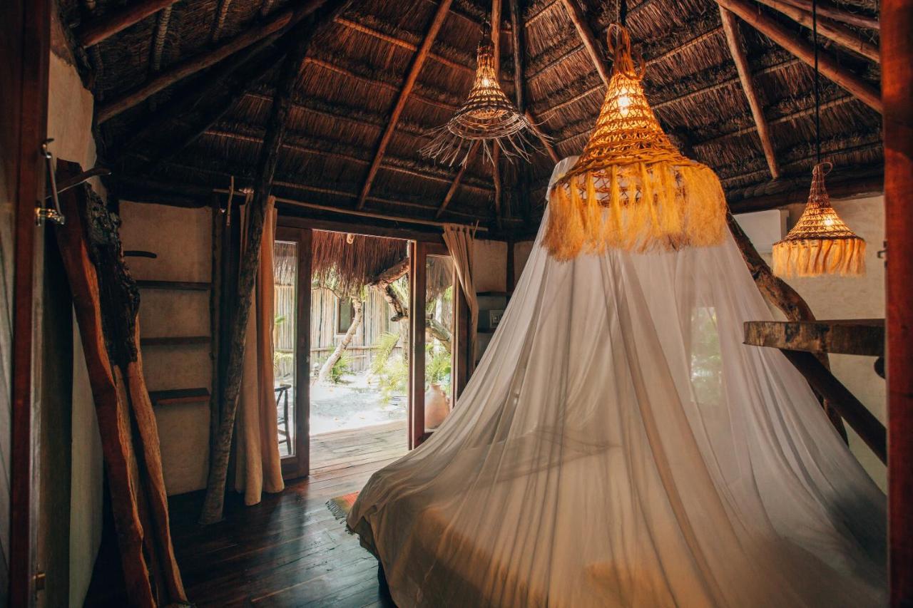 Ikal Tulum Hotel ภายนอก รูปภาพ Interior of a bungalow at the resort