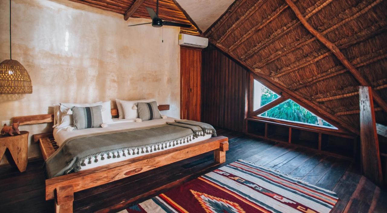 Ikal Tulum Hotel ภายนอก รูปภาพ A bedroom at the hotel