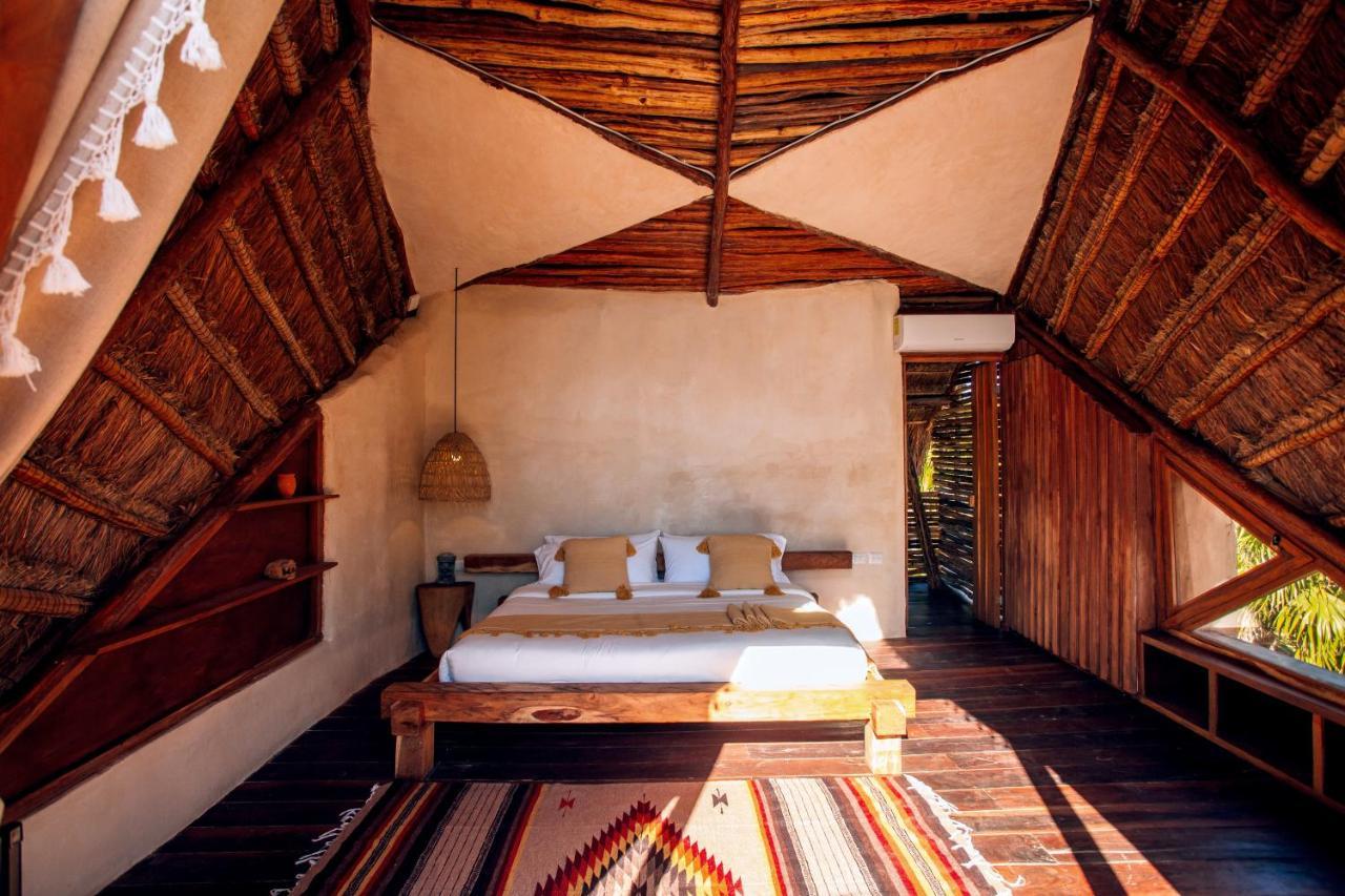 Ikal Tulum Hotel ภายนอก รูปภาพ Interior of a villa at the resort