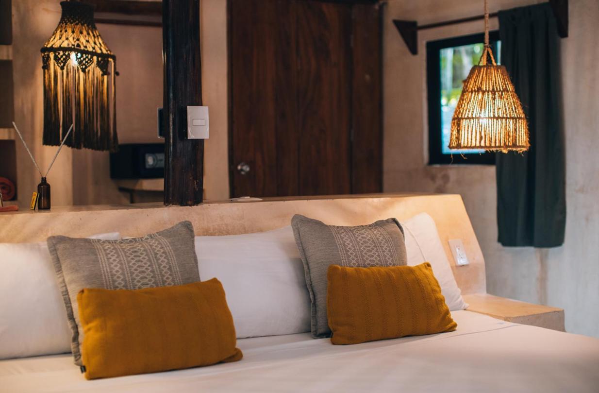 Ikal Tulum Hotel ภายนอก รูปภาพ A bedroom at the hotel