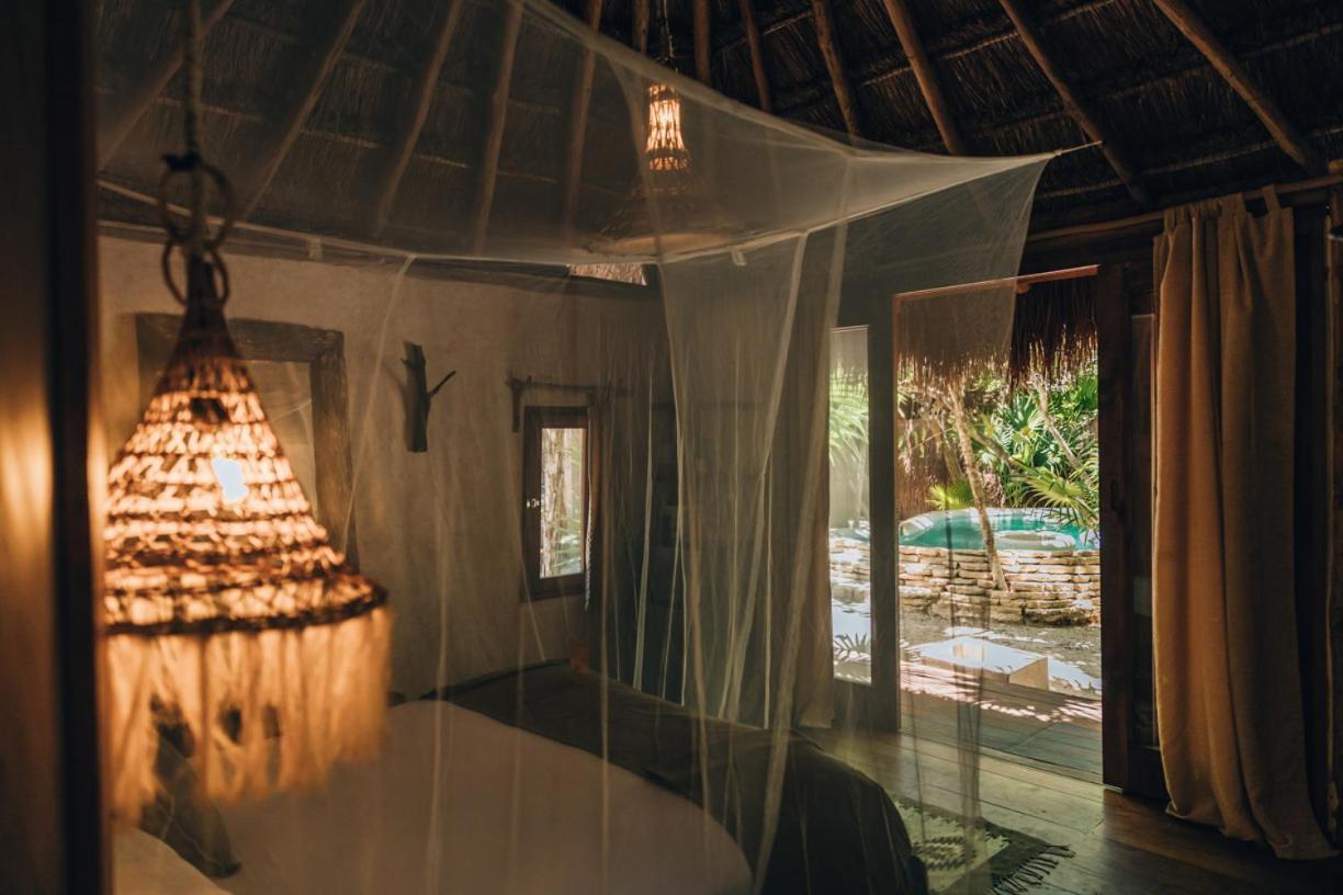 Ikal Tulum Hotel ภายนอก รูปภาพ Interior of a bungalow